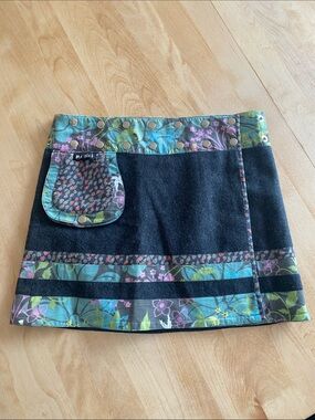 Desigual-Inspired Black Mini Skirt with Teal Floral Trim